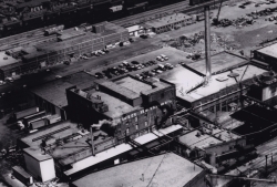 Armour complex after the Office Building had burned and was removed. The building with smoke stack is the last of these that were part of the original complex.    