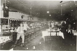 Photo of the Maverick Saloon and Cafe, on the corner of E. Exchange and N. Main.   